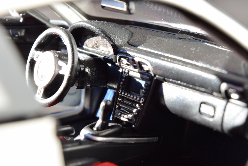 Illustration for article titled RennSport Battle: 997 911 GT3 RS 4.0, AUTOart v. Bburago